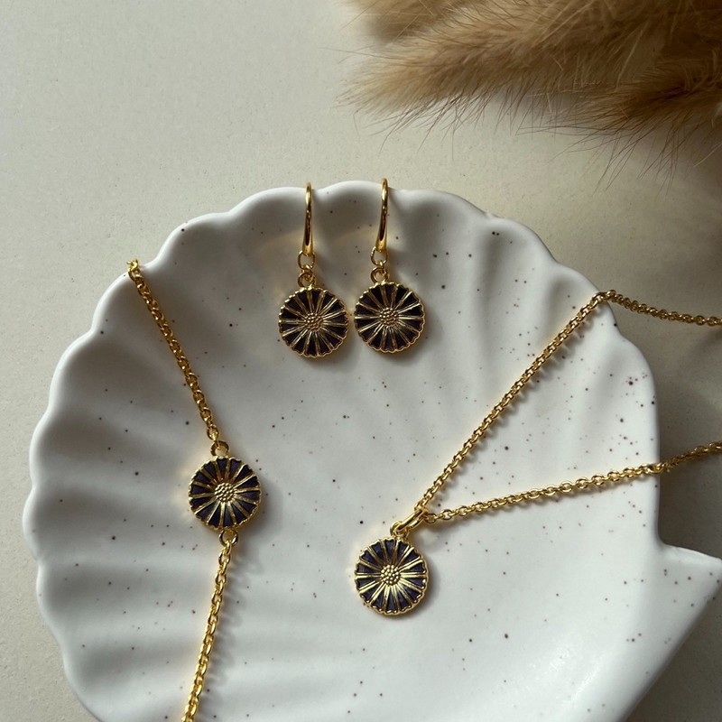 Marguerit smykker med lilla blomster fra Lund Copenhagen